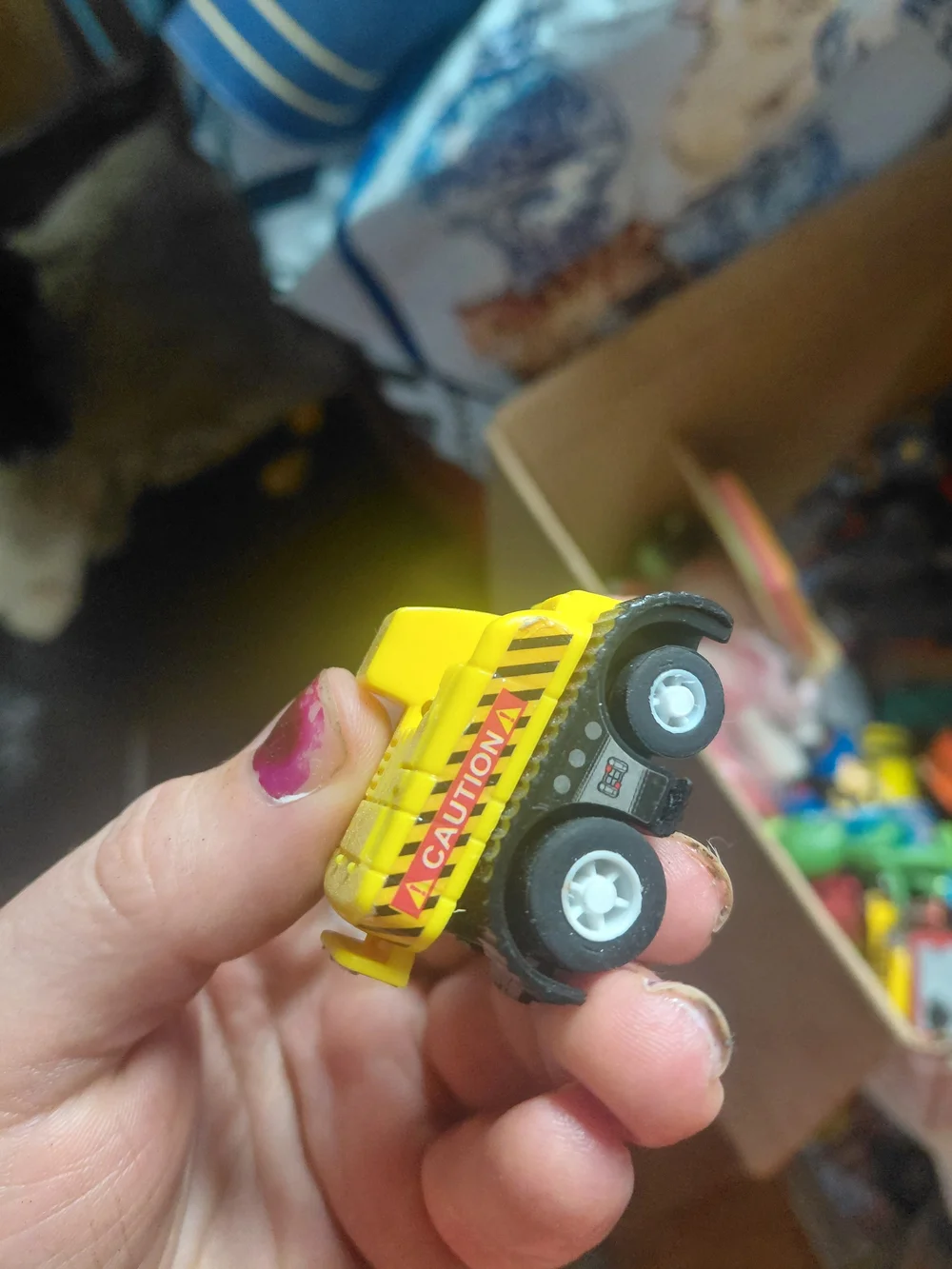 yellow plastic Kid Galaxy bulldozer toy features 